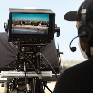 Kameramann filmt Hauptversammlung